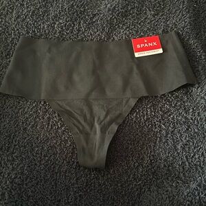 Medium Black Spanx. New with tag